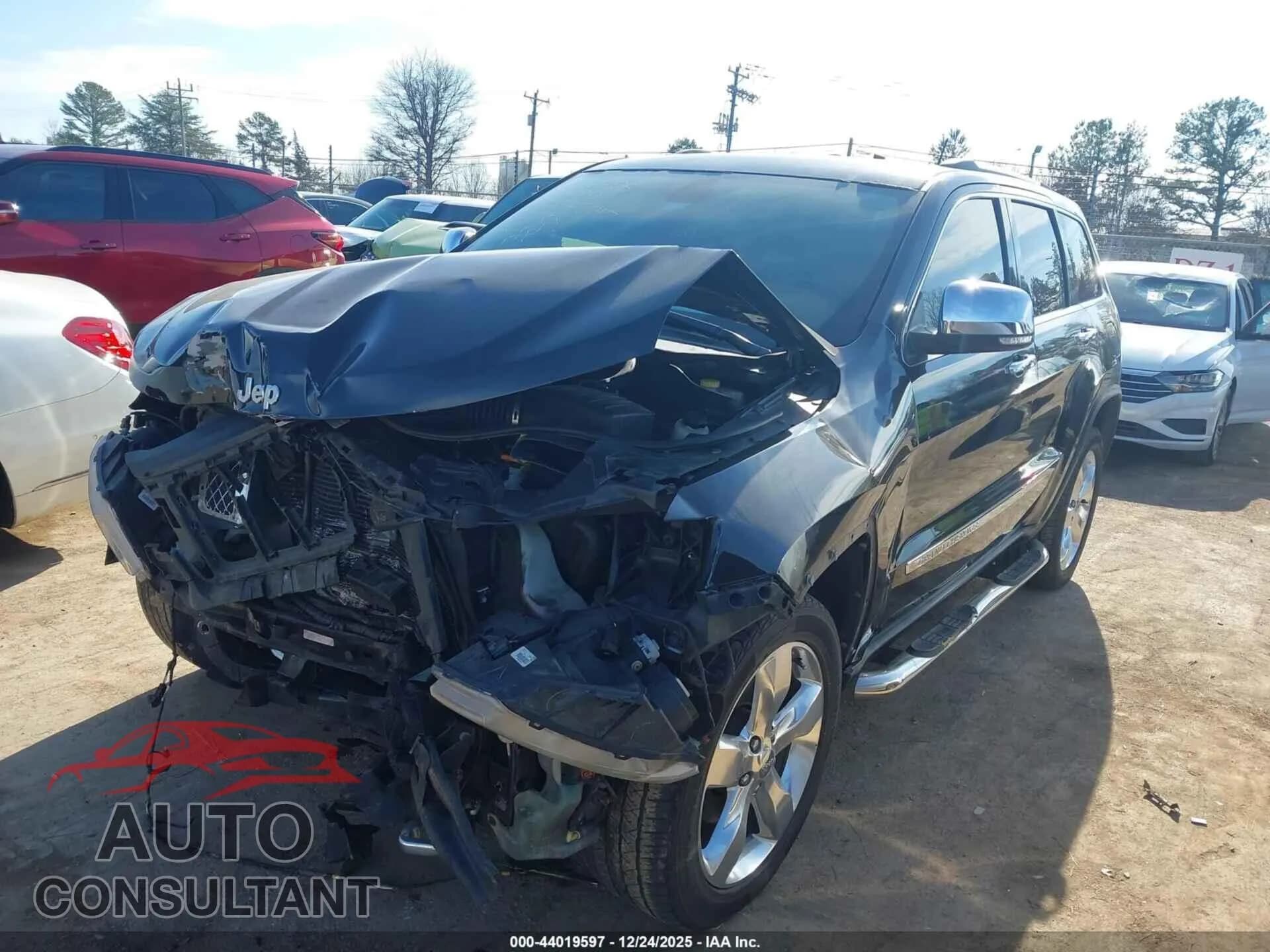 2013 JEEP GRAND CHEROKEE Damaged VIN 1C4RJECT5DC644847 – rear exterior 2013 JEEP GRAND CHEROKEE Damaged VIN 1C4RJECT5DC644847 – rear exterior