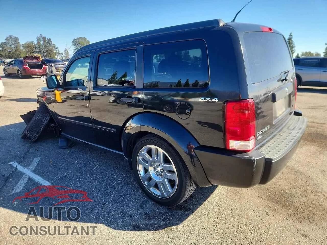 2011 DODGE NITRO Damaged VIN 1D4PU4GXXBW501493 – rear exterior 2011 DODGE NITRO Damaged VIN 1D4PU4GXXBW501493 – rear exterior