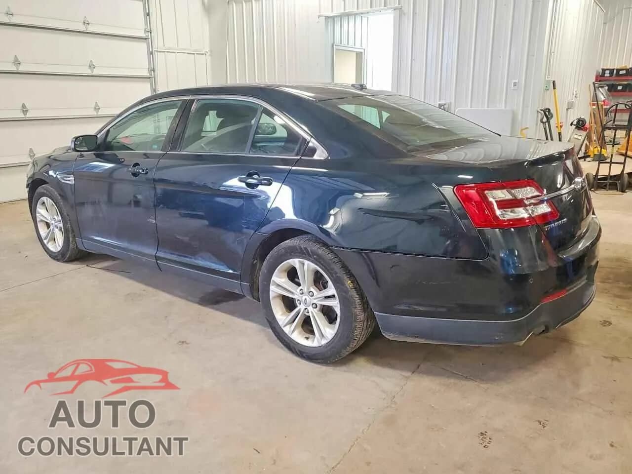2015 FORD TAURUS Used VIN 1FAHP2E86FG127673 – rear exterior 2015 FORD TAURUS Used VIN 1FAHP2E86FG127673 – rear exterior