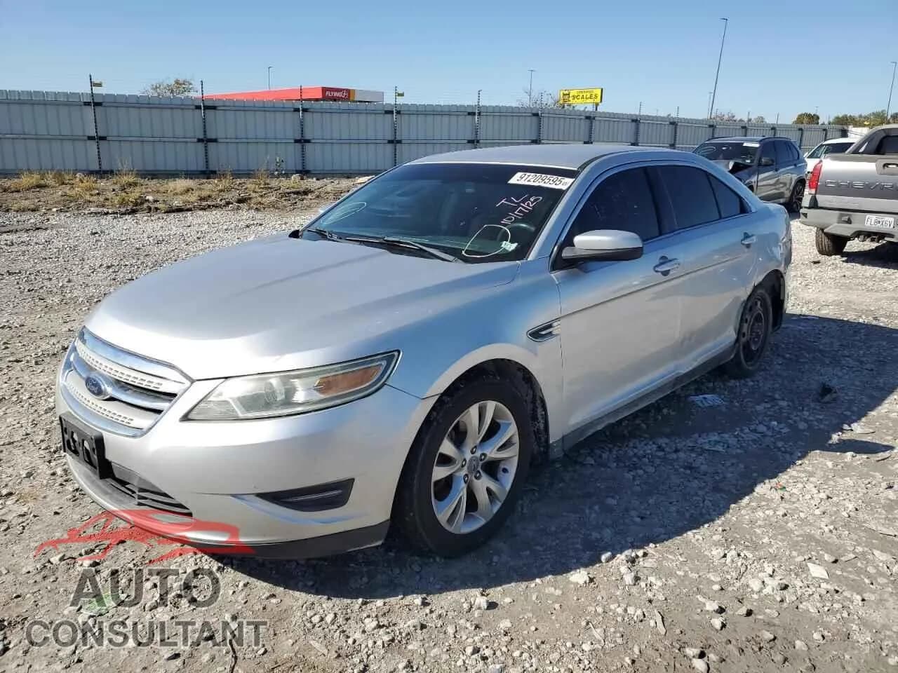 2010 FORD TAURUS Damaged VIN 1FAHP2EW1AG100355 – front exterior 2010 FORD TAURUS Damaged VIN 1FAHP2EW1AG100355 – front exterior