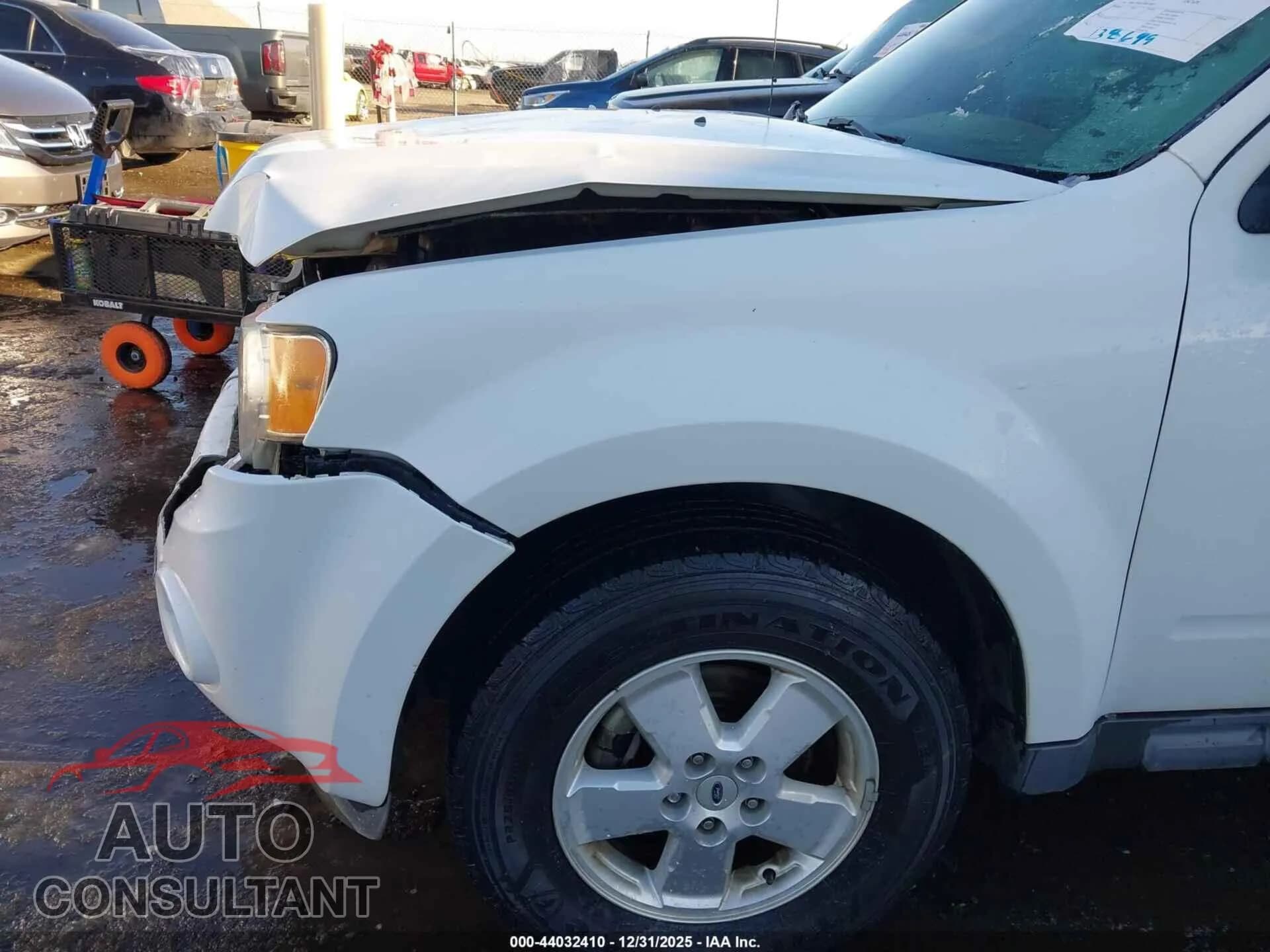 2011 FORD ESCAPE Damaged VIN 1FMCU0DG1BKB79869 – engine bay 2011 FORD ESCAPE Damaged VIN 1FMCU0DG1BKB79869 – engine bay