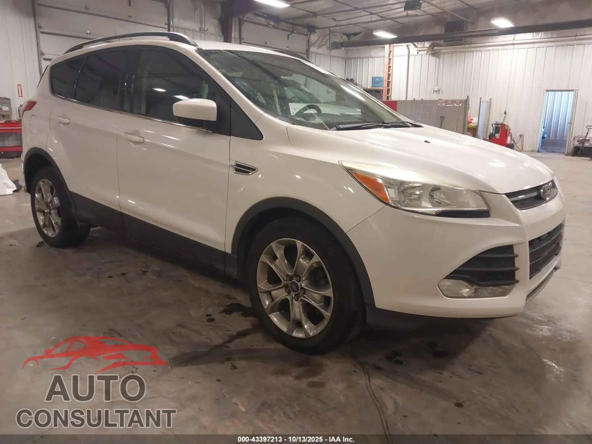 2014 FORD ESCAPE Damaged VIN 1FMCU0GX8EUB70705 – front exterior 2014 FORD ESCAPE Damaged VIN 1FMCU0GX8EUB70705 – front exterior