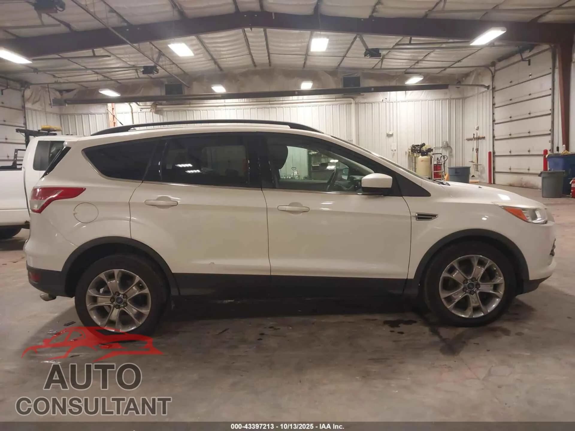 2014 FORD ESCAPE Damaged VIN 1FMCU0GX8EUB70705 – photo 14 2014 FORD ESCAPE Damaged VIN 1FMCU0GX8EUB70705 – photo 14