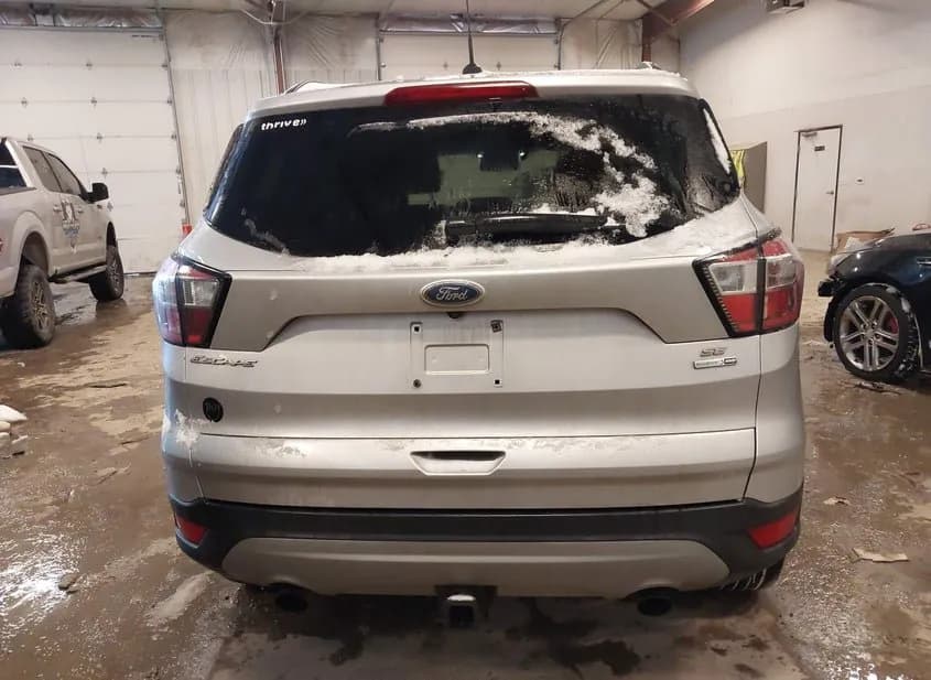 2017 FORD Escape Used VIN 1FMCU9G99HUE46304 – trunk area 2017 FORD Escape Used VIN 1FMCU9G99HUE46304 – trunk area