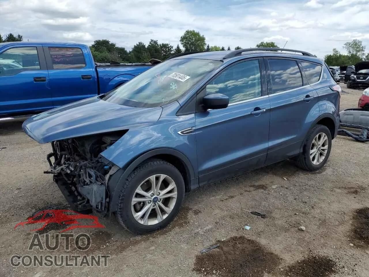 2018 FORD ESCAPE Damaged VIN 1FMCU9GD0JUC89966 – front exterior 2018 FORD ESCAPE Damaged VIN 1FMCU9GD0JUC89966 – front exterior