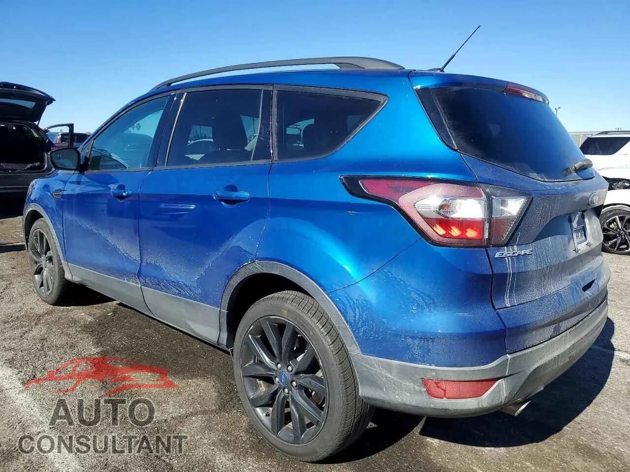 2018 FORD ESCAPE Damaged VIN 1FMCU9GD3JUA99546 – rear exterior 2018 FORD ESCAPE Damaged VIN 1FMCU9GD3JUA99546 – rear exterior