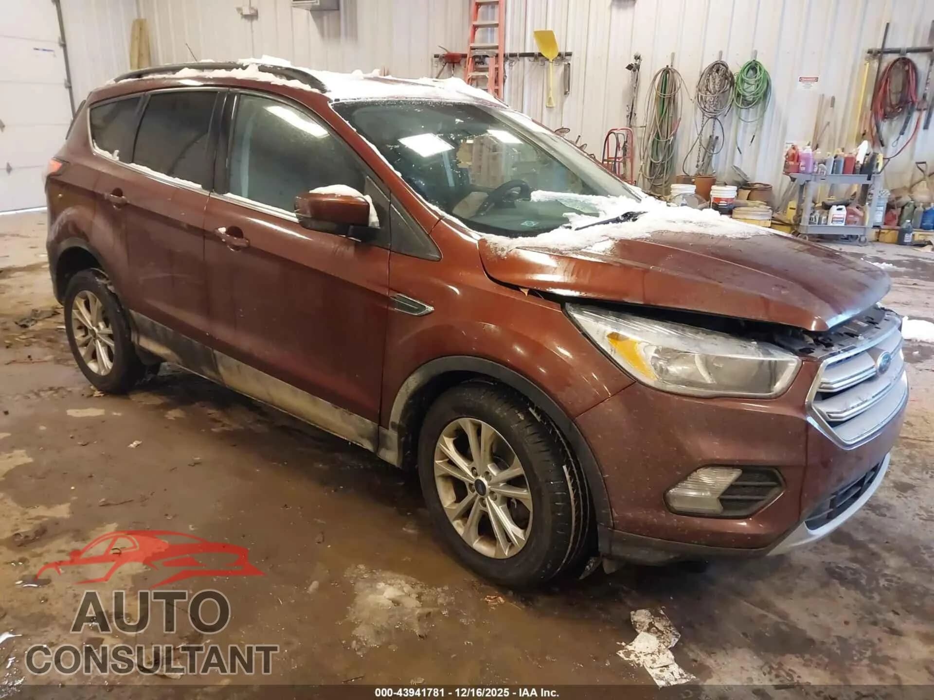 2018 FORD ESCAPE Damaged VIN 1FMCU9GD7JUC58391 – front exterior 2018 FORD ESCAPE Damaged VIN 1FMCU9GD7JUC58391 – front exterior
