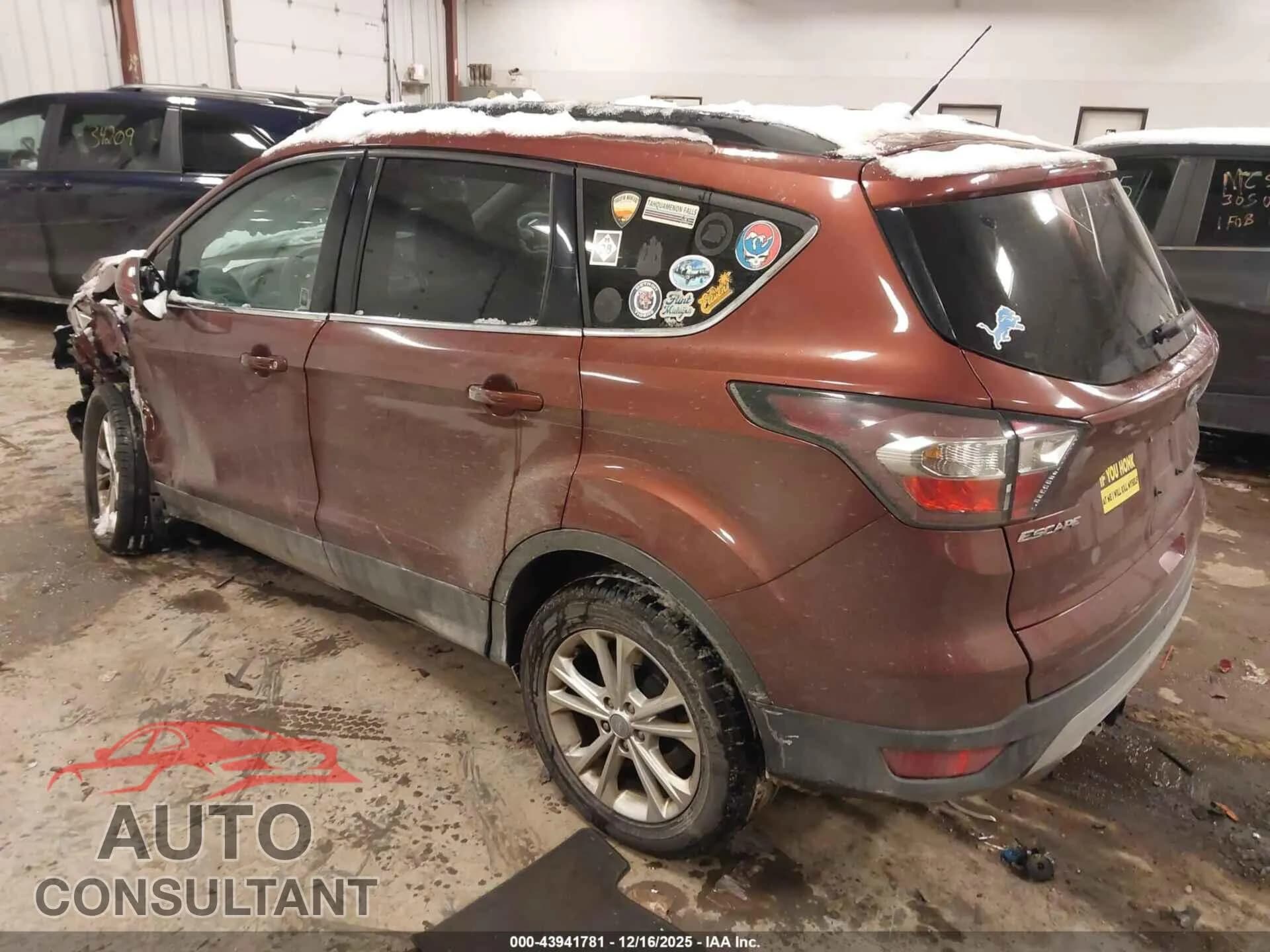 2018 FORD ESCAPE Damaged VIN 1FMCU9GD7JUC58391 – side profile 2018 FORD ESCAPE Damaged VIN 1FMCU9GD7JUC58391 – side profile