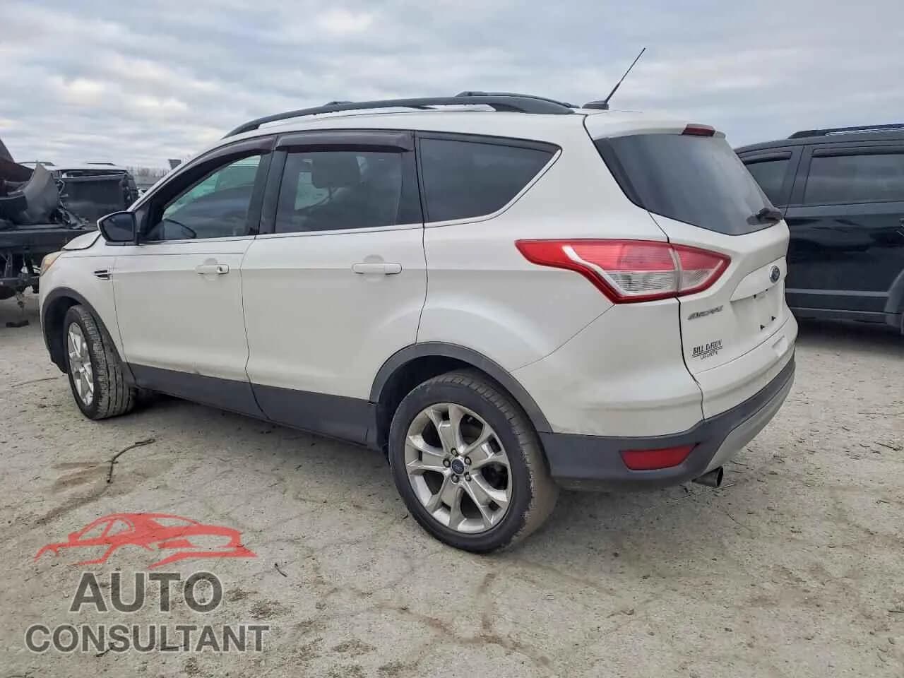2013 FORD ESCAPE Damaged VIN 1FMCU9GX1DUA28957 – rear exterior 2013 FORD ESCAPE Damaged VIN 1FMCU9GX1DUA28957 – rear exterior