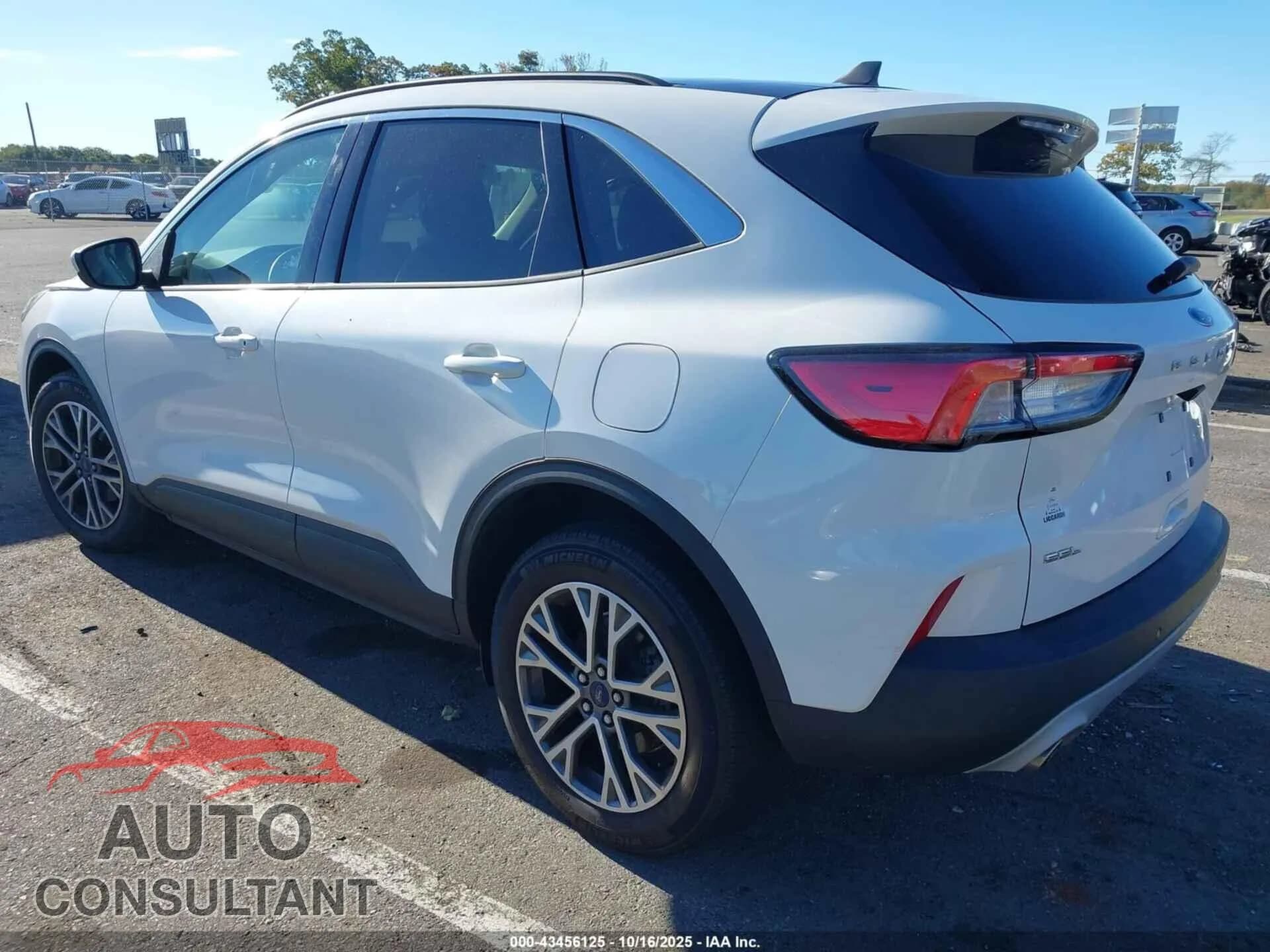 2021 FORD ESCAPE Damaged VIN 1FMCU9H6XMUB34460 – side profile 2021 FORD ESCAPE Damaged VIN 1FMCU9H6XMUB34460 – side profile