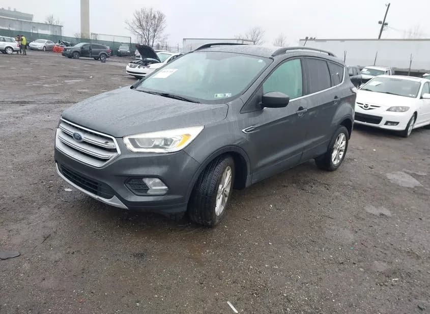 2018 FORD Escape Used VIN 1FMCU9HD1JUA77950 – side profile 2018 FORD Escape Used VIN 1FMCU9HD1JUA77950 – side profile