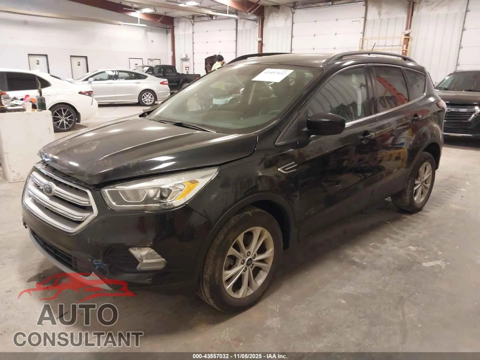 2018 FORD ESCAPE Damaged VIN 1FMCU9HD8JUA96527 – rear exterior 2018 FORD ESCAPE Damaged VIN 1FMCU9HD8JUA96527 – rear exterior