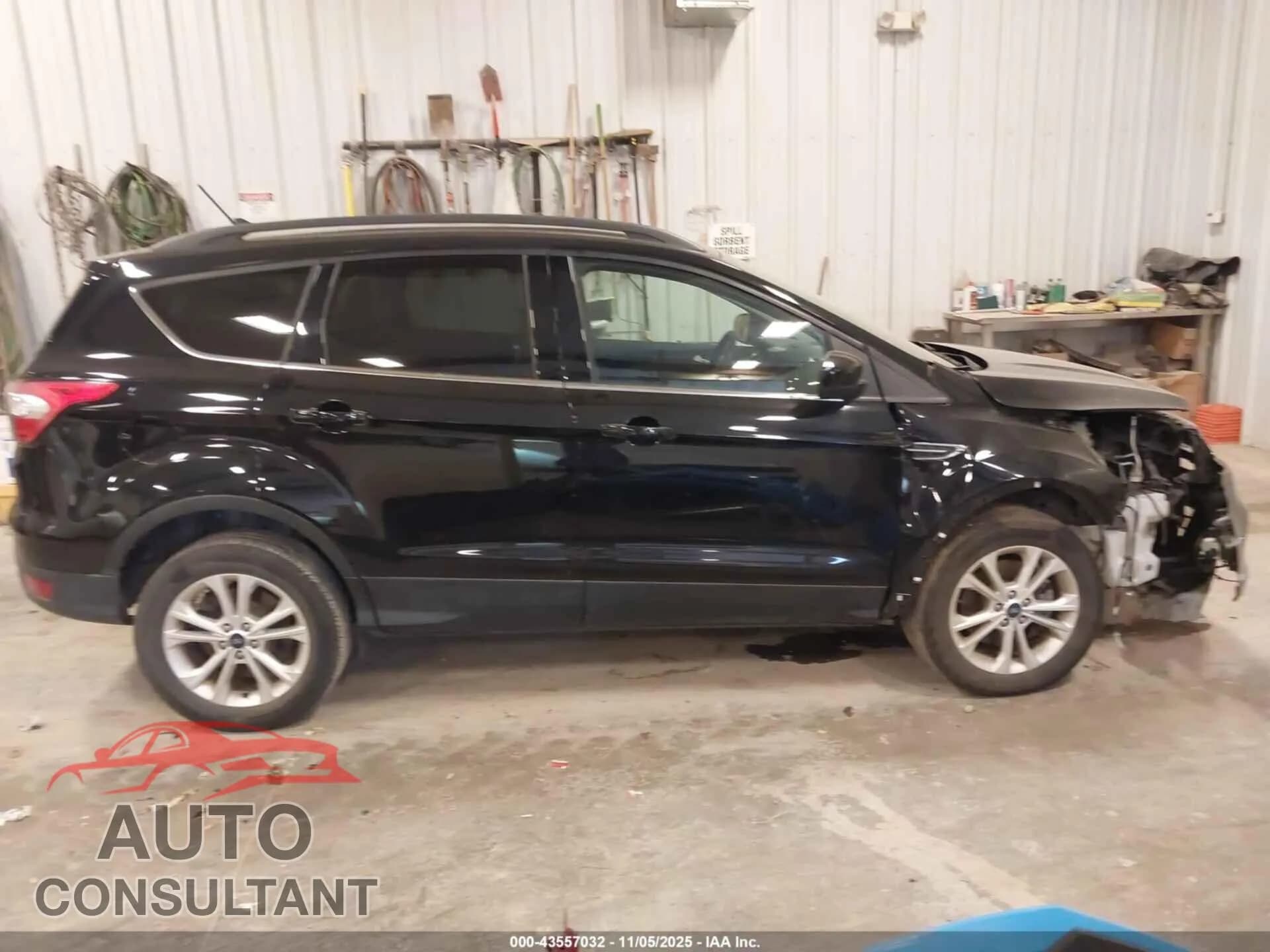 2018 FORD ESCAPE Damaged VIN 1FMCU9HD8JUA96527 – photo 13 2018 FORD ESCAPE Damaged VIN 1FMCU9HD8JUA96527 – photo 13