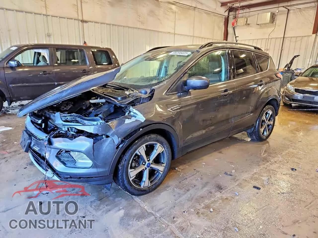 2018 FORD ESCAPE Damaged VIN 1FMCU9HDXJUA85643 – front exterior 2018 FORD ESCAPE Damaged VIN 1FMCU9HDXJUA85643 – front exterior