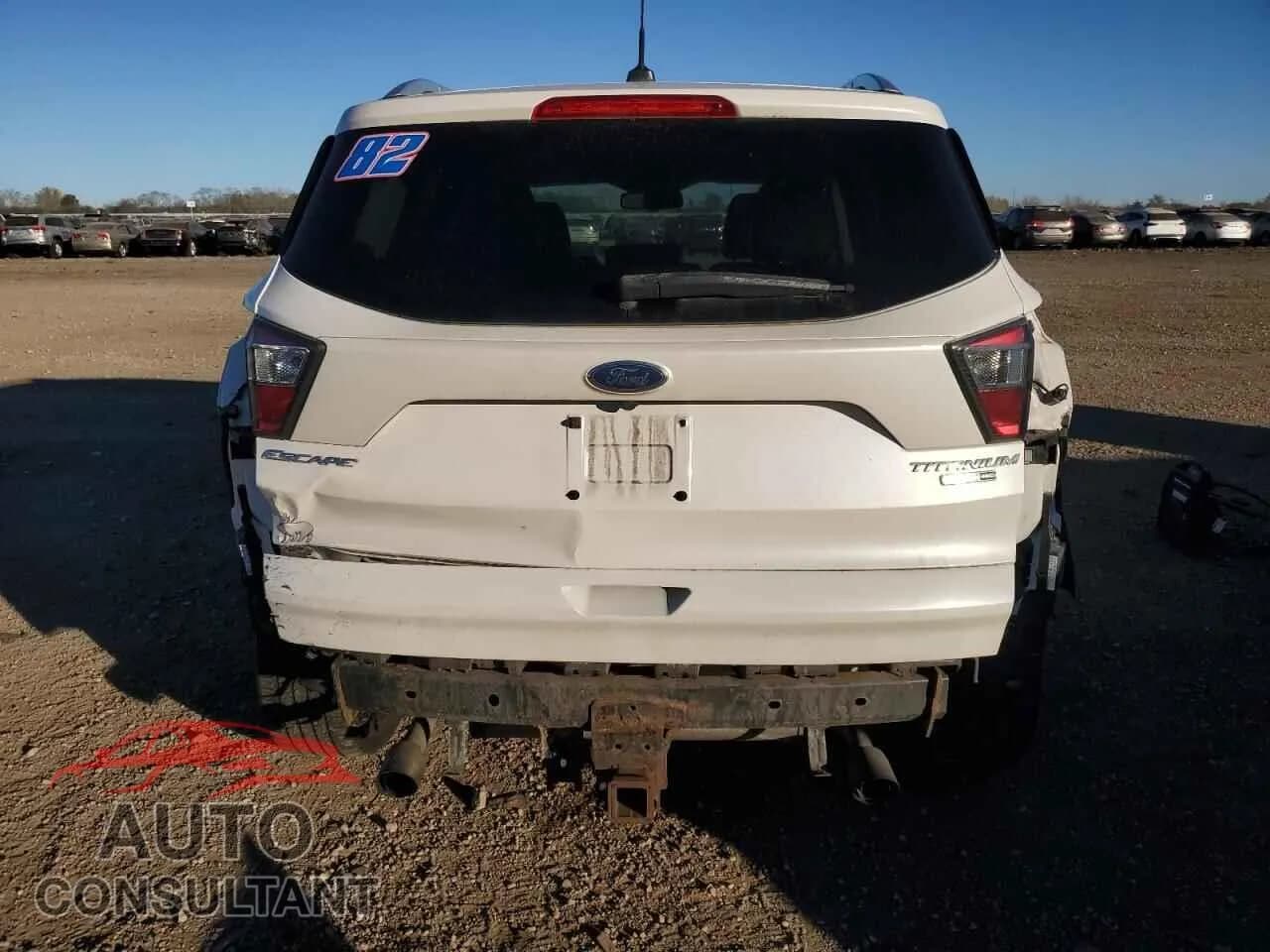 2017 FORD ESCAPE Damaged VIN 1FMCU9J91HUA89760 – engine bay 2017 FORD ESCAPE Damaged VIN 1FMCU9J91HUA89760 – engine bay