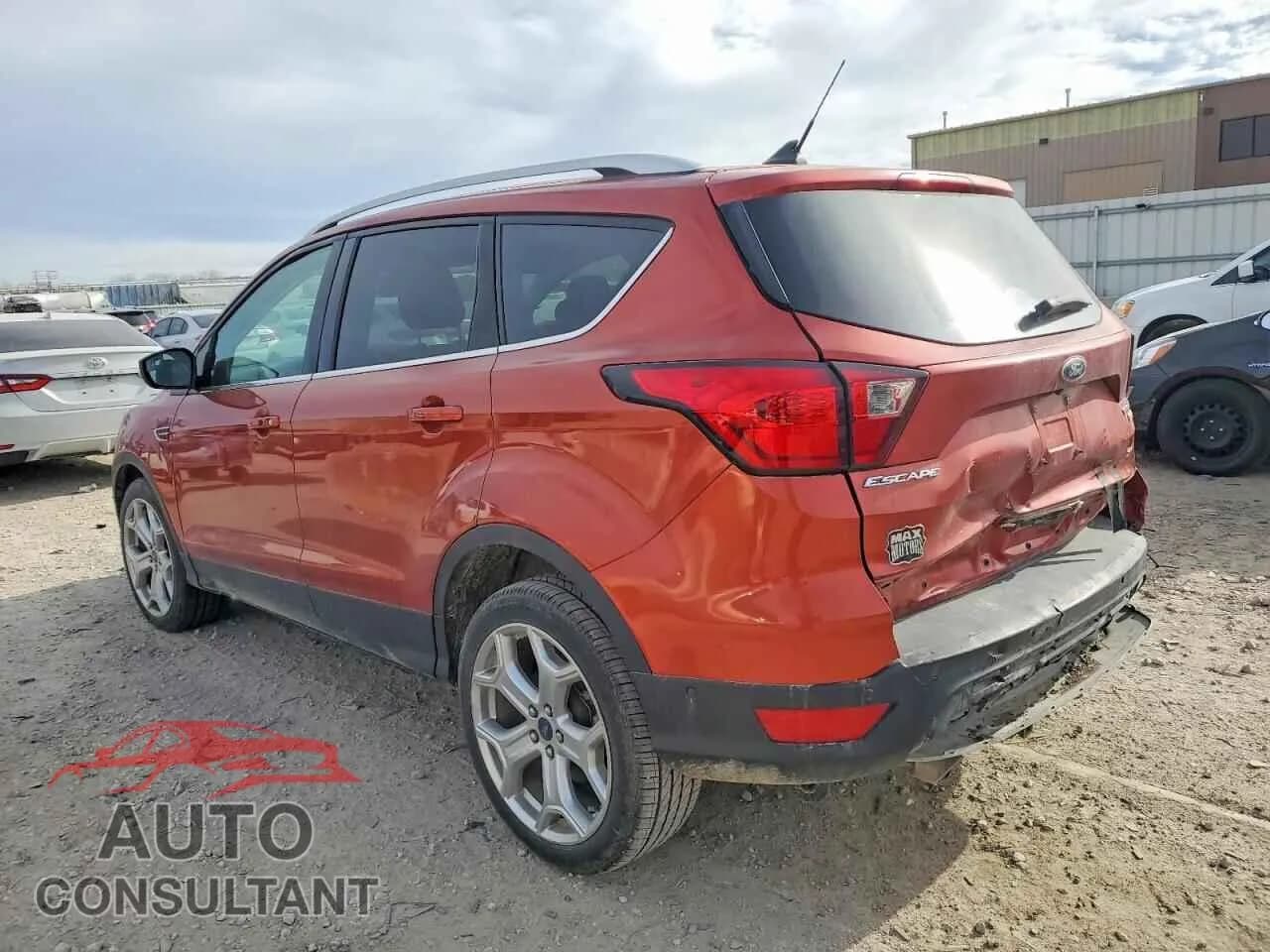 2019 FORD ESCAPE Damaged VIN 1FMCU9J94KUA39832 – rear exterior 2019 FORD ESCAPE Damaged VIN 1FMCU9J94KUA39832 – rear exterior