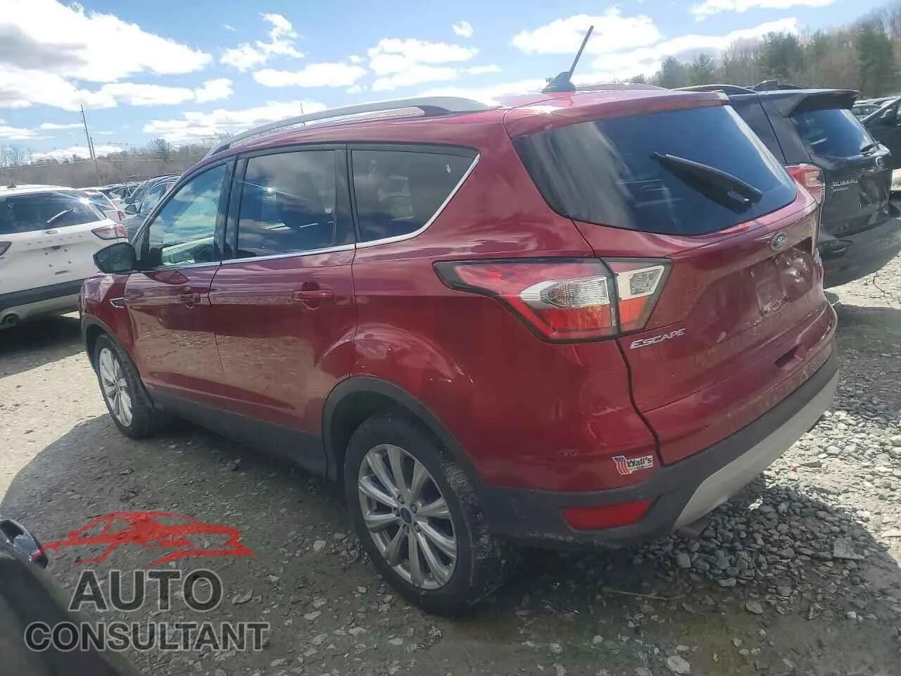 2018 FORD ESCAPE Used VIN 1FMCU9J95JUA38784 – rear exterior 2018 FORD ESCAPE Used VIN 1FMCU9J95JUA38784 – rear exterior