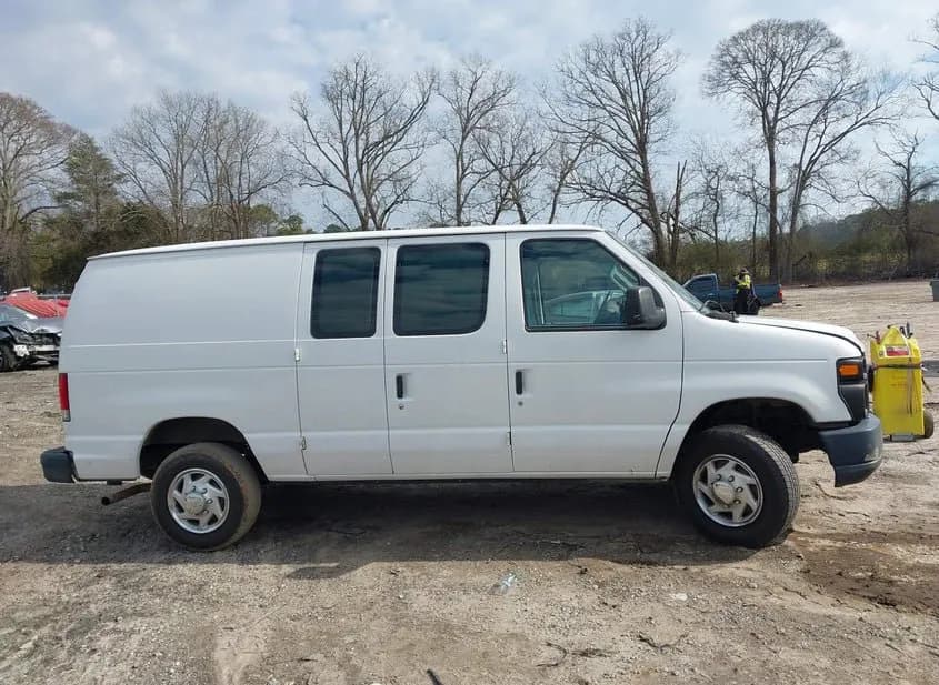 2014 FORD E-150 Used VIN 1FTNE1EW4EDA16342 – rear exterior 2014 FORD E-150 Used VIN 1FTNE1EW4EDA16342 – rear exterior