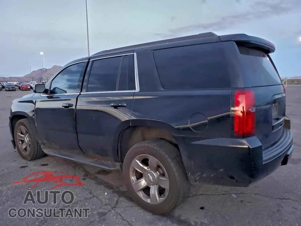 2015 CHEVROLET TAHOE Damaged VIN 1GNSCBKC3FR606049 – rear exterior 2015 CHEVROLET TAHOE Damaged VIN 1GNSCBKC3FR606049 – rear exterior