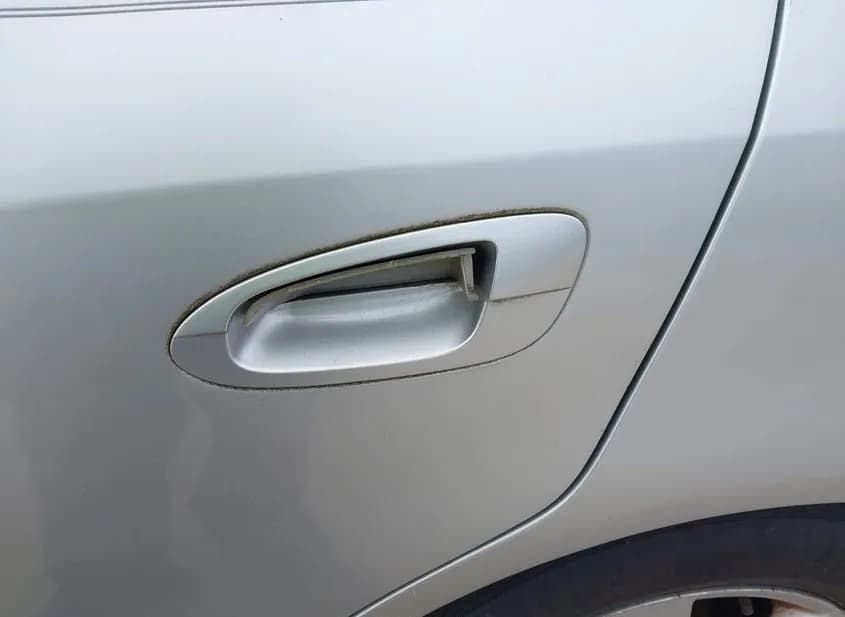 2004 NISSAN Altima Used VIN 1N4AL11D74C120679 – trunk area 2004 NISSAN Altima Used VIN 1N4AL11D74C120679 – trunk area