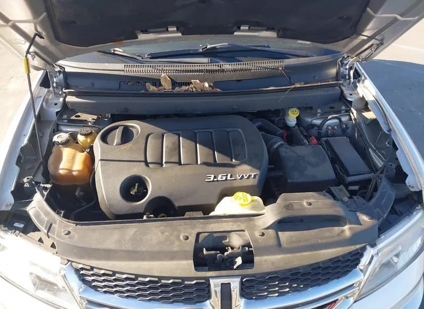 2012 DODGE Journey Used VIN 3C4PDDBGXCT323726 – rear exterior 2012 DODGE Journey Used VIN 3C4PDDBGXCT323726 – rear exterior