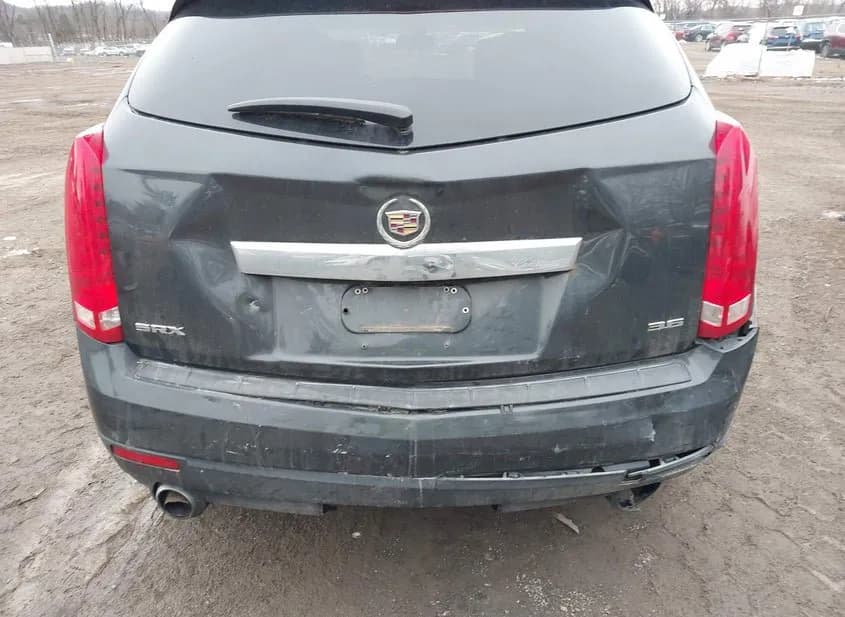 2014 CADILLAC SRX Used VIN 3GYFNAE34ES544077 – trunk area 2014 CADILLAC SRX Used VIN 3GYFNAE34ES544077 – trunk area