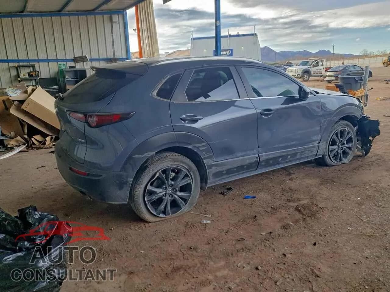 2022 MAZDA CX30 Damaged VIN 3MVDMBCL4NM446680 – side profile 2022 MAZDA CX30 Damaged VIN 3MVDMBCL4NM446680 – side profile
