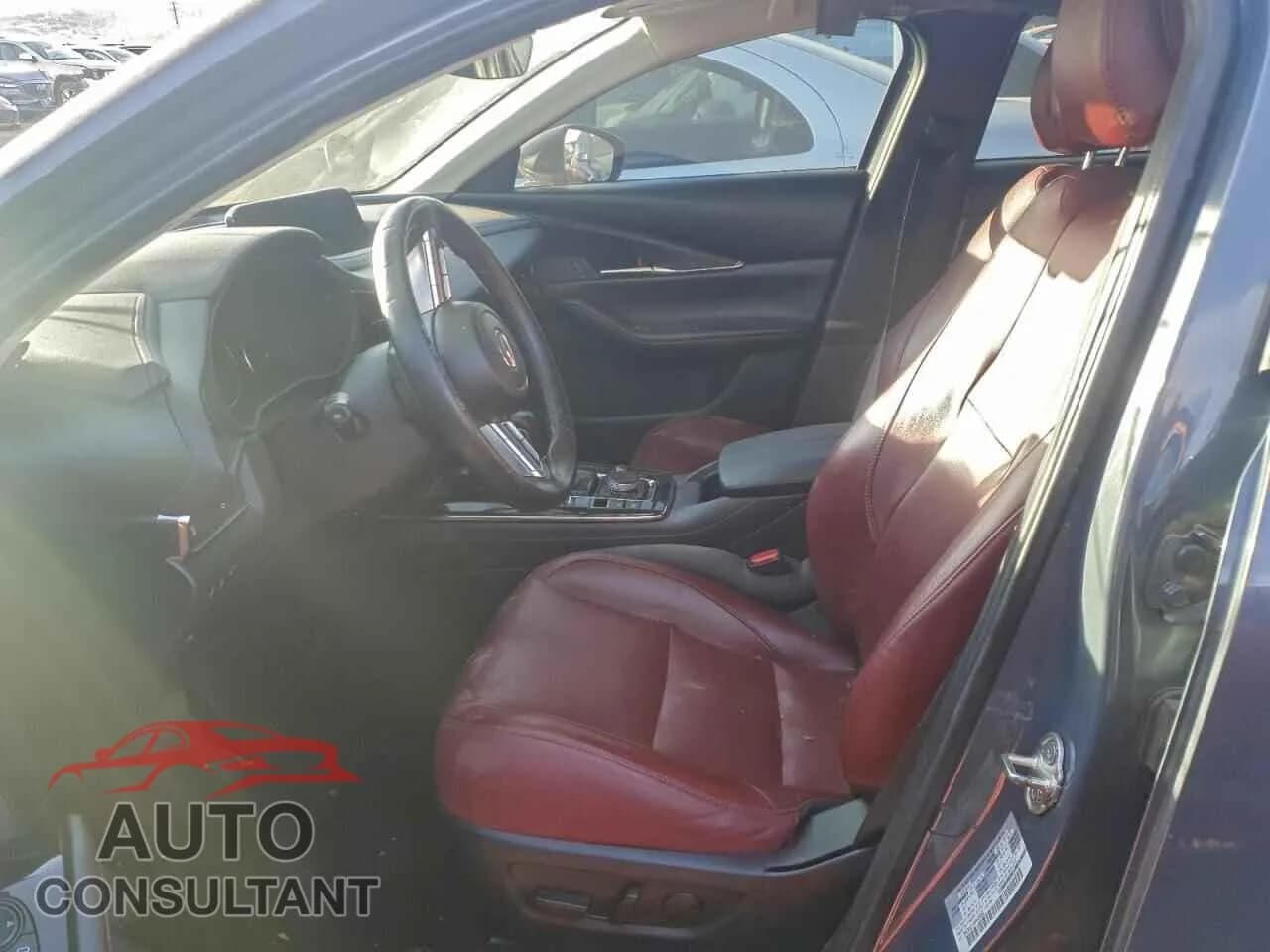 2022 MAZDA CX30 Damaged VIN 3MVDMBCL4NM446680 – exterior detail 2022 MAZDA CX30 Damaged VIN 3MVDMBCL4NM446680 – exterior detail