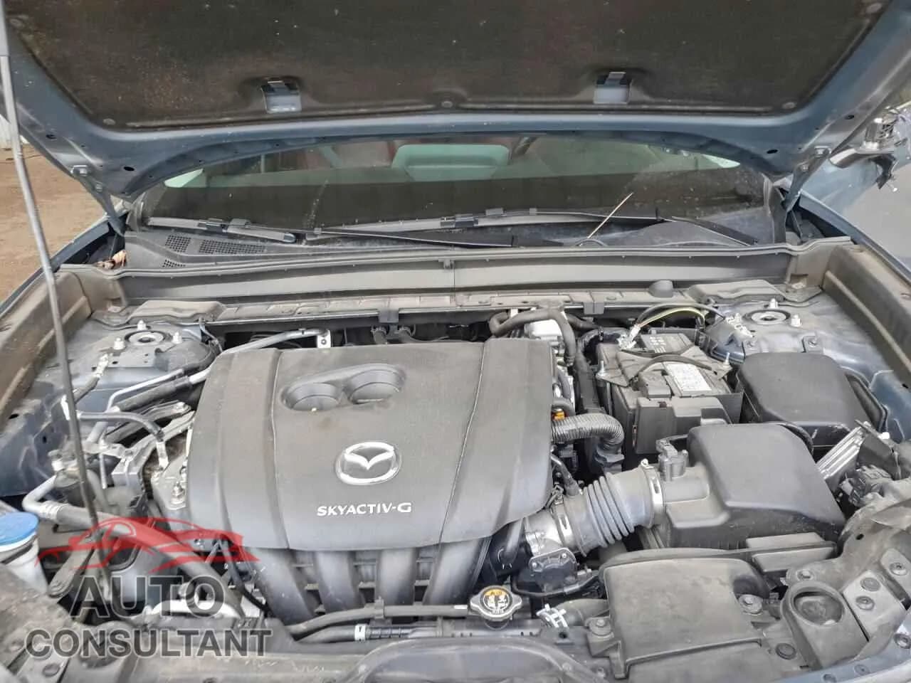 2022 MAZDA CX30 Damaged VIN 3MVDMBCL4NM446680 – photo 11 2022 MAZDA CX30 Damaged VIN 3MVDMBCL4NM446680 – photo 11