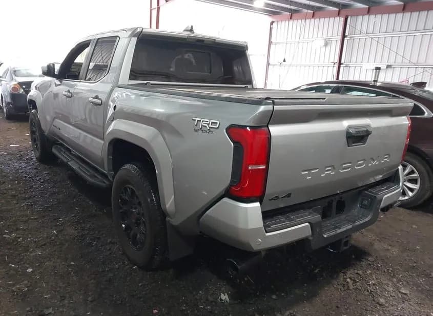 2024 TOYOTA TACOMA Used VIN 3TMLB5JNXRM036979 – trunk area 2024 TOYOTA TACOMA Used VIN 3TMLB5JNXRM036979 – trunk area