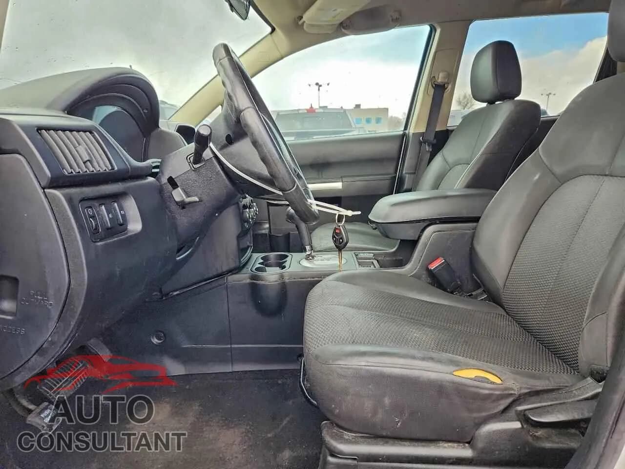 2011 MITSUBISHI ENDEAVOR Damaged VIN 4A4JN2AS5BE027632 – exterior detail 2011 MITSUBISHI ENDEAVOR Damaged VIN 4A4JN2AS5BE027632 – exterior detail