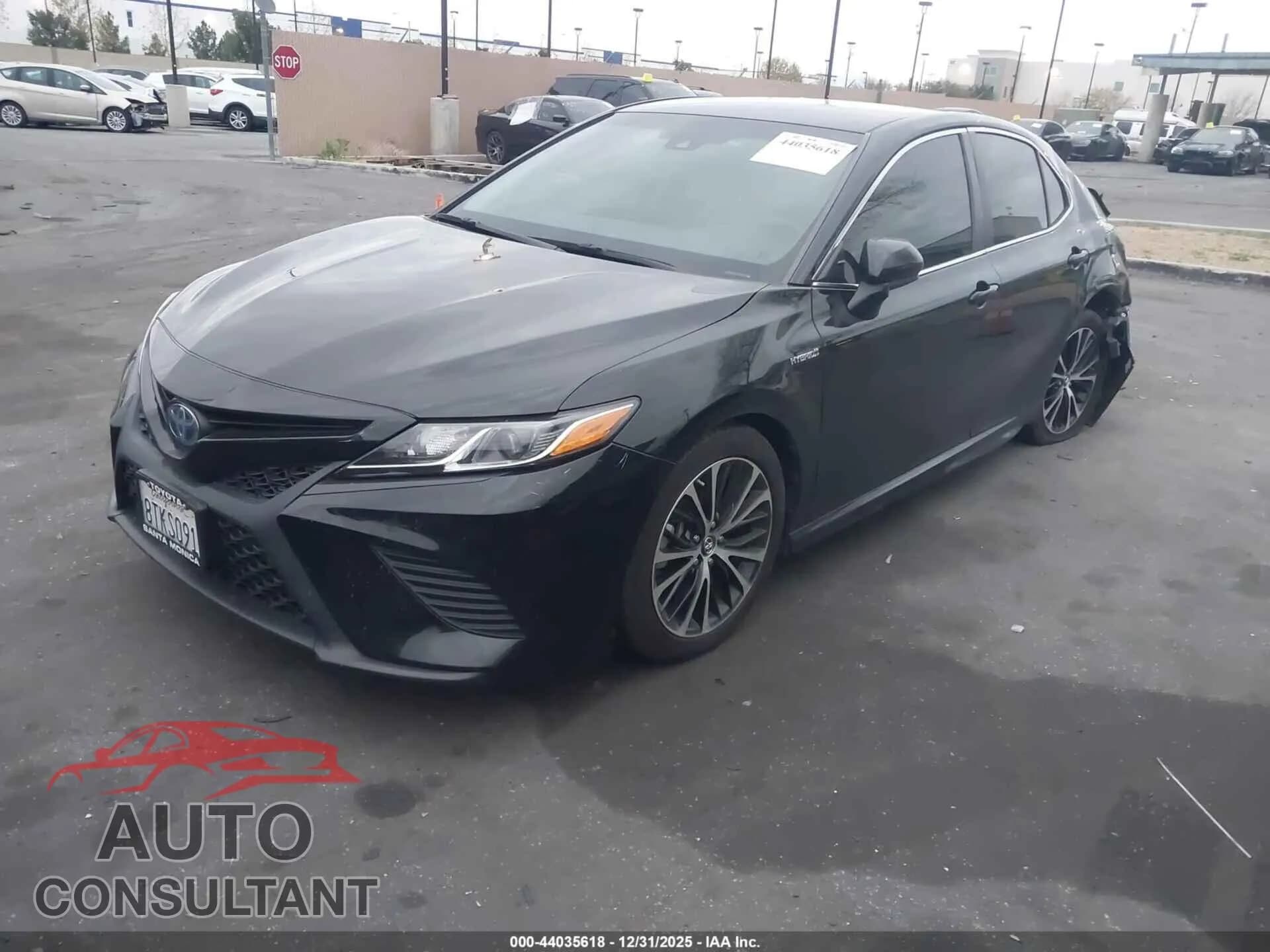 2018 TOYOTA CAMRY HYBRID Damaged VIN 4T1B21HK2JU003647 – rear exterior 2018 TOYOTA CAMRY HYBRID Damaged VIN 4T1B21HK2JU003647 – rear exterior