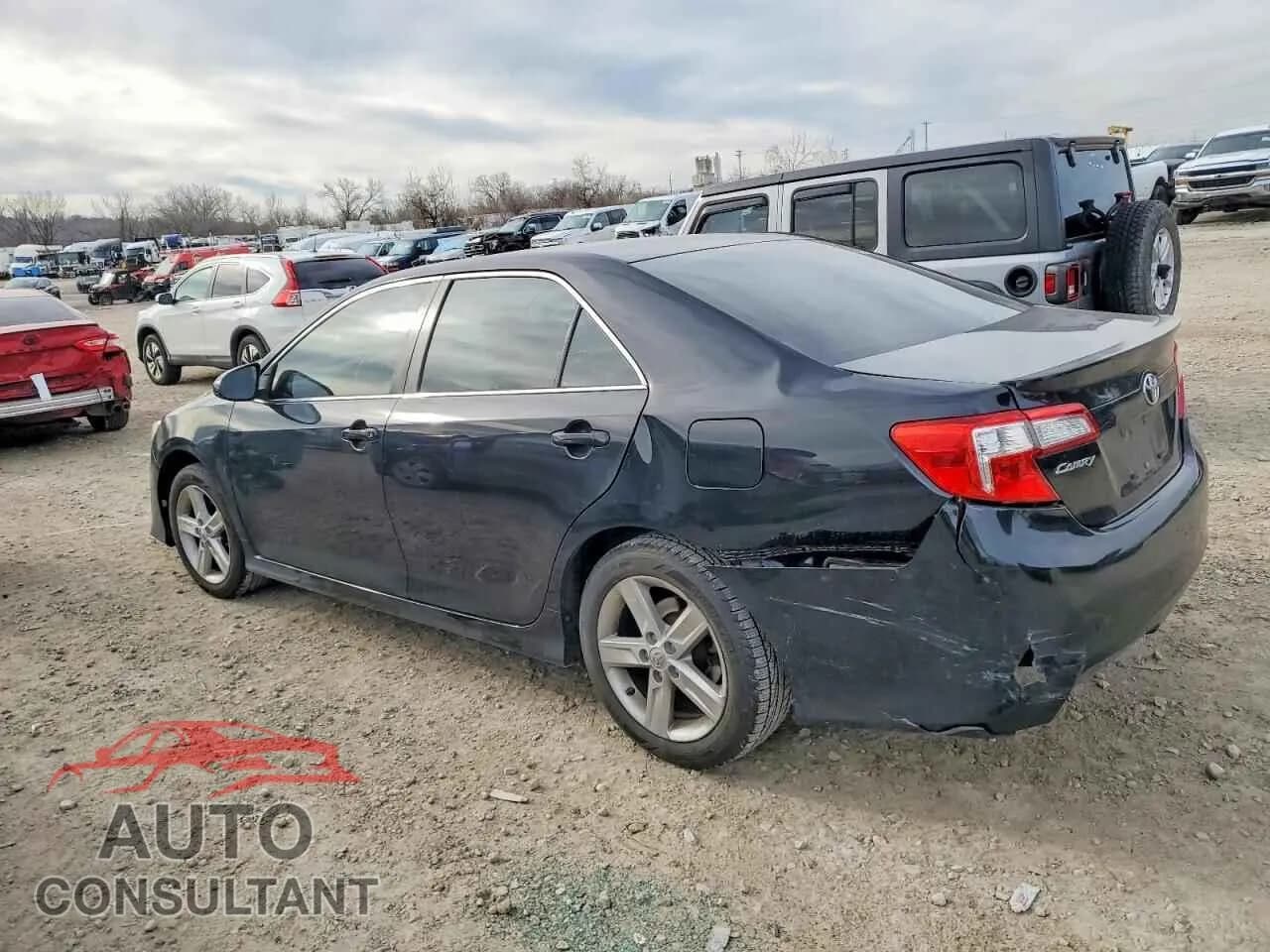 2013 TOYOTA CAMRY Damaged VIN 4T1BF1FK5DU674029 – rear exterior 2013 TOYOTA CAMRY Damaged VIN 4T1BF1FK5DU674029 – rear exterior
