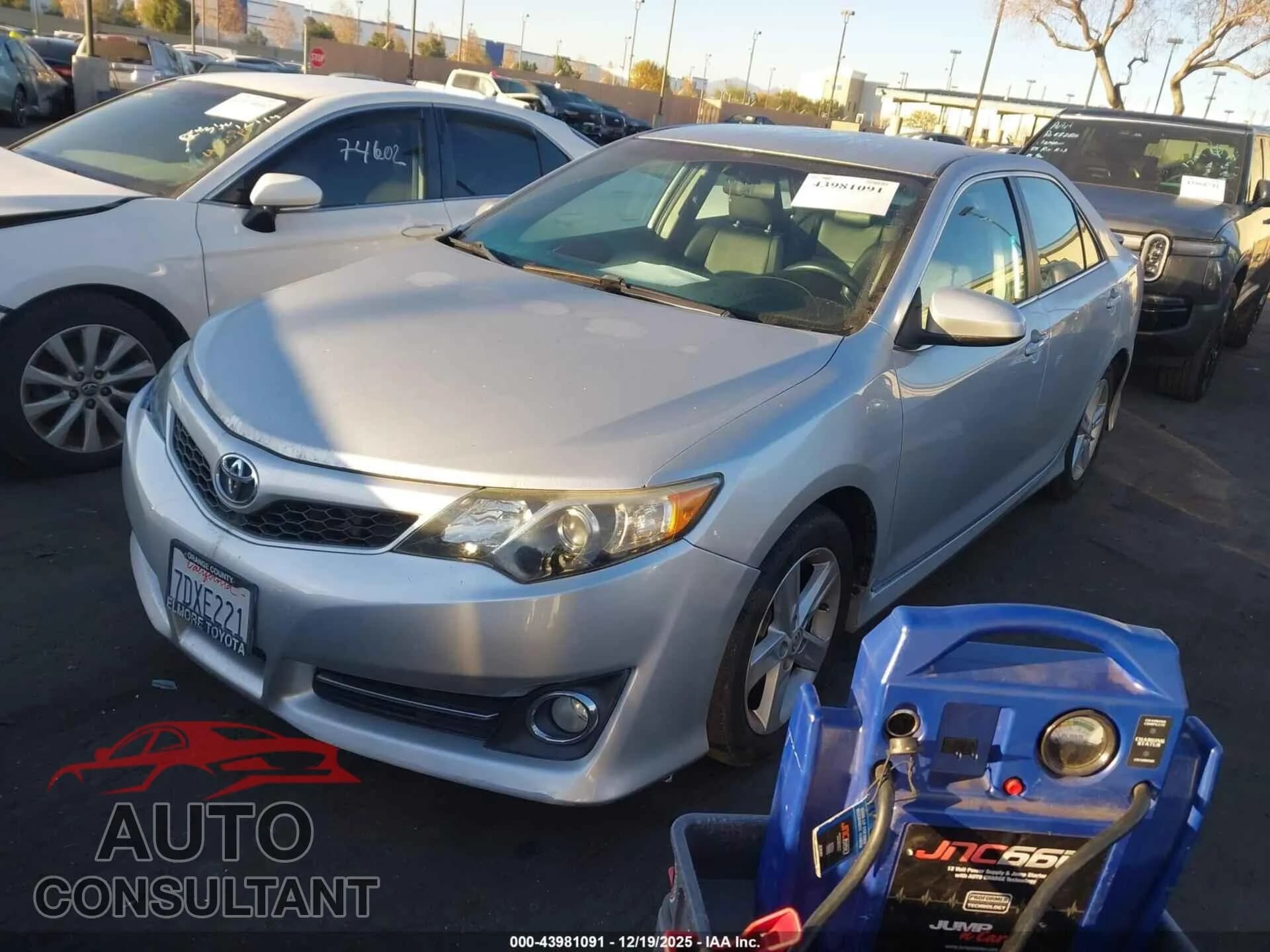 2014 TOYOTA CAMRY Damaged VIN 4T1BF1FK9EU763927 – rear exterior 2014 TOYOTA CAMRY Damaged VIN 4T1BF1FK9EU763927 – rear exterior