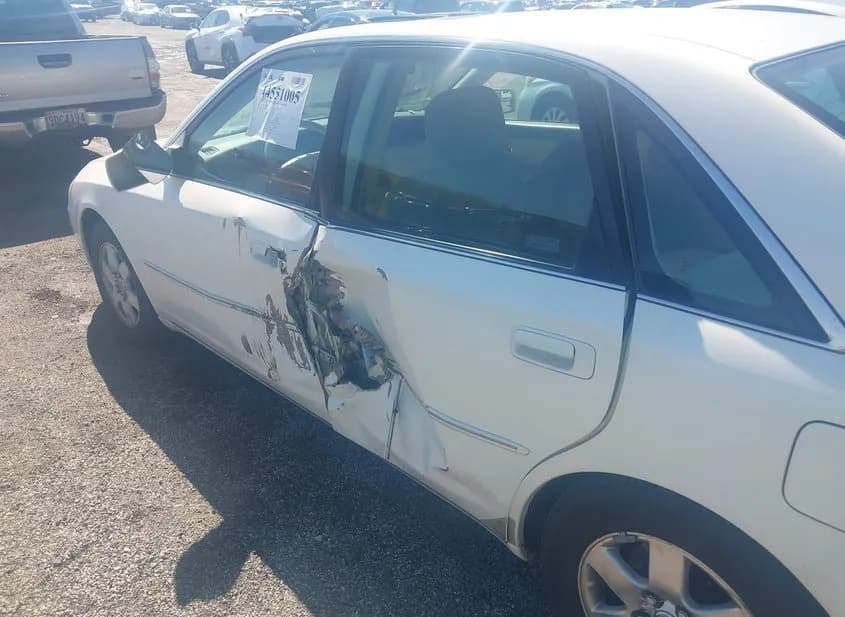 2000 TOYOTA Avalon Used VIN 4T1BF28B2YU002423 – side profile 2000 TOYOTA Avalon Used VIN 4T1BF28B2YU002423 – side profile