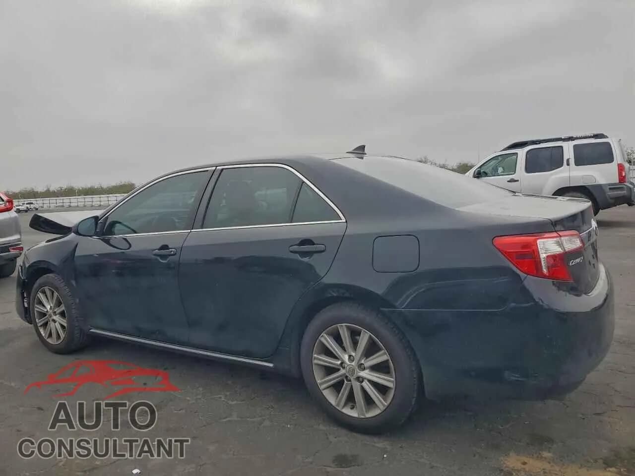 2012 TOYOTA CAMRY Damaged VIN 4T1BK1FK8CU502281 – rear exterior 2012 TOYOTA CAMRY Damaged VIN 4T1BK1FK8CU502281 – rear exterior