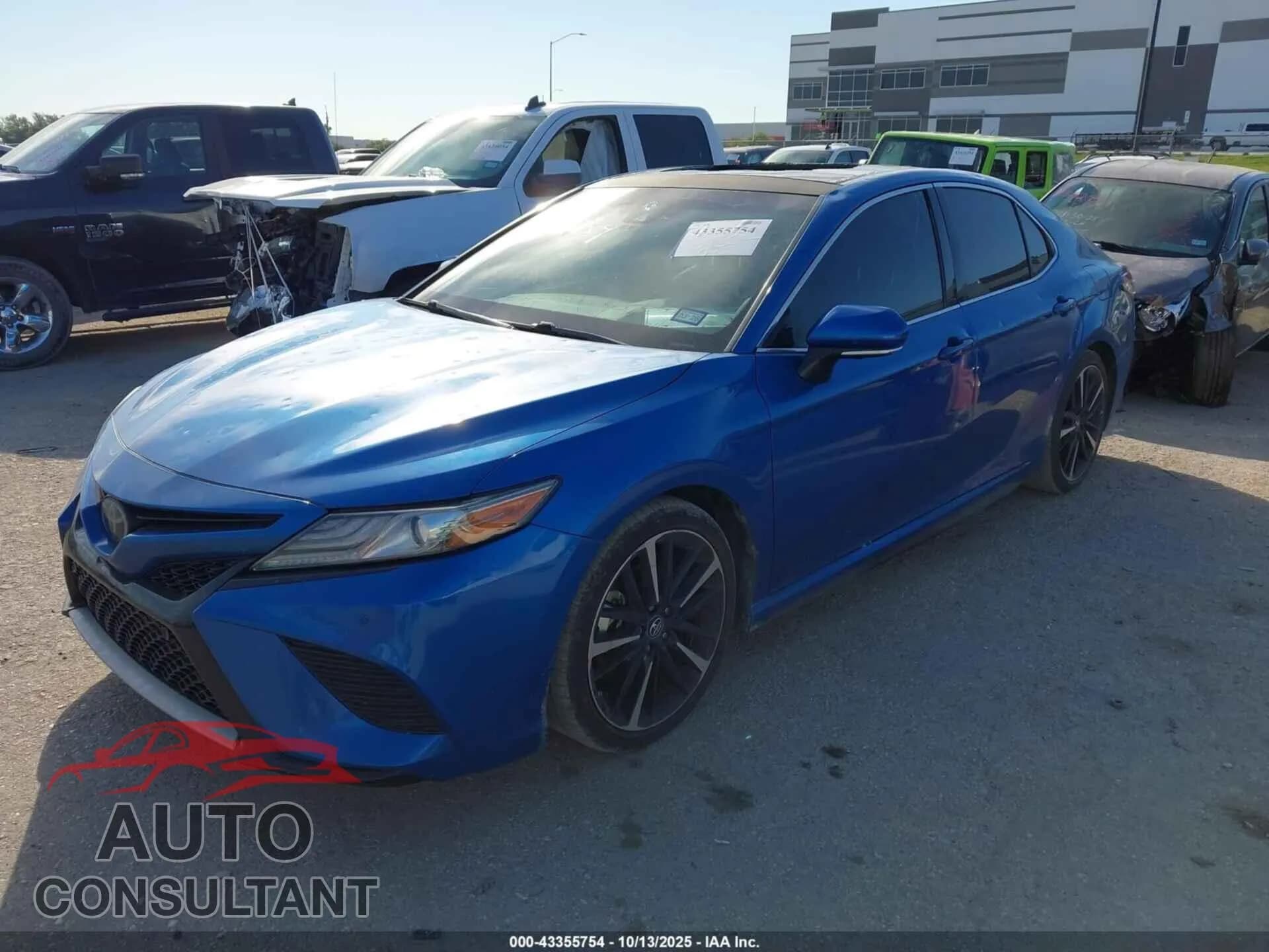 2018 TOYOTA CAMRY Damaged VIN 4T1BZ1HK6JU019569 – rear exterior 2018 TOYOTA CAMRY Damaged VIN 4T1BZ1HK6JU019569 – rear exterior