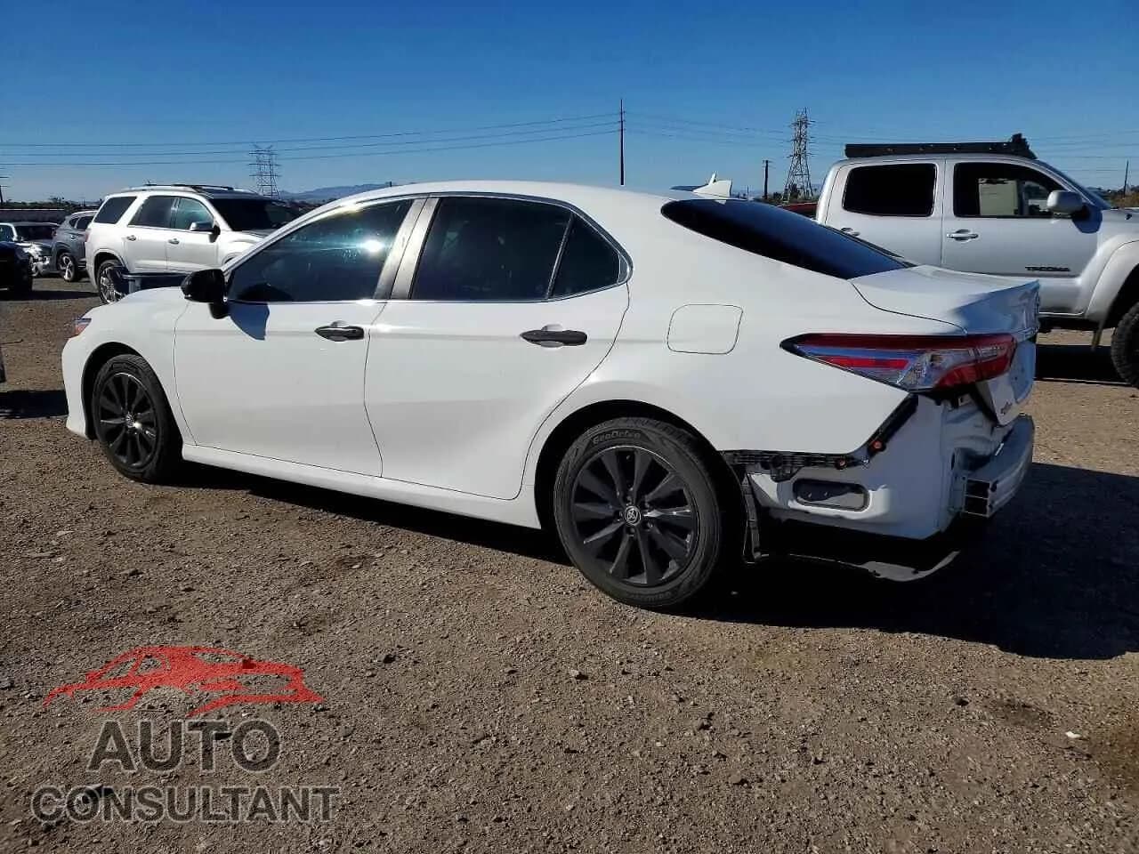2020 TOYOTA CAMRY Damaged VIN 4T1C11AKXLU983455 – rear exterior 2020 TOYOTA CAMRY Damaged VIN 4T1C11AKXLU983455 – rear exterior