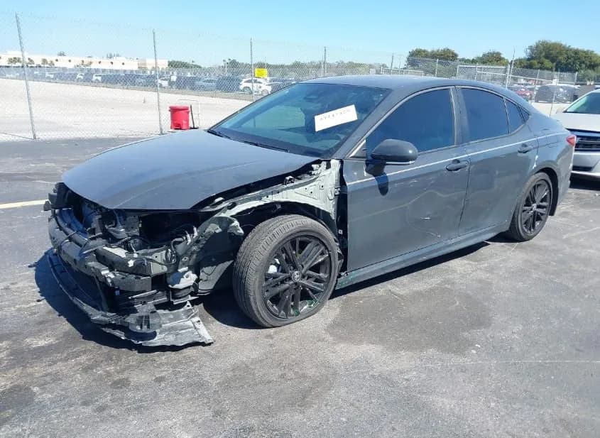 2026 TOYOTA CAMRY Used VIN 4T1DAACK4TU256832 – trunk area 2026 TOYOTA CAMRY Used VIN 4T1DAACK4TU256832 – trunk area