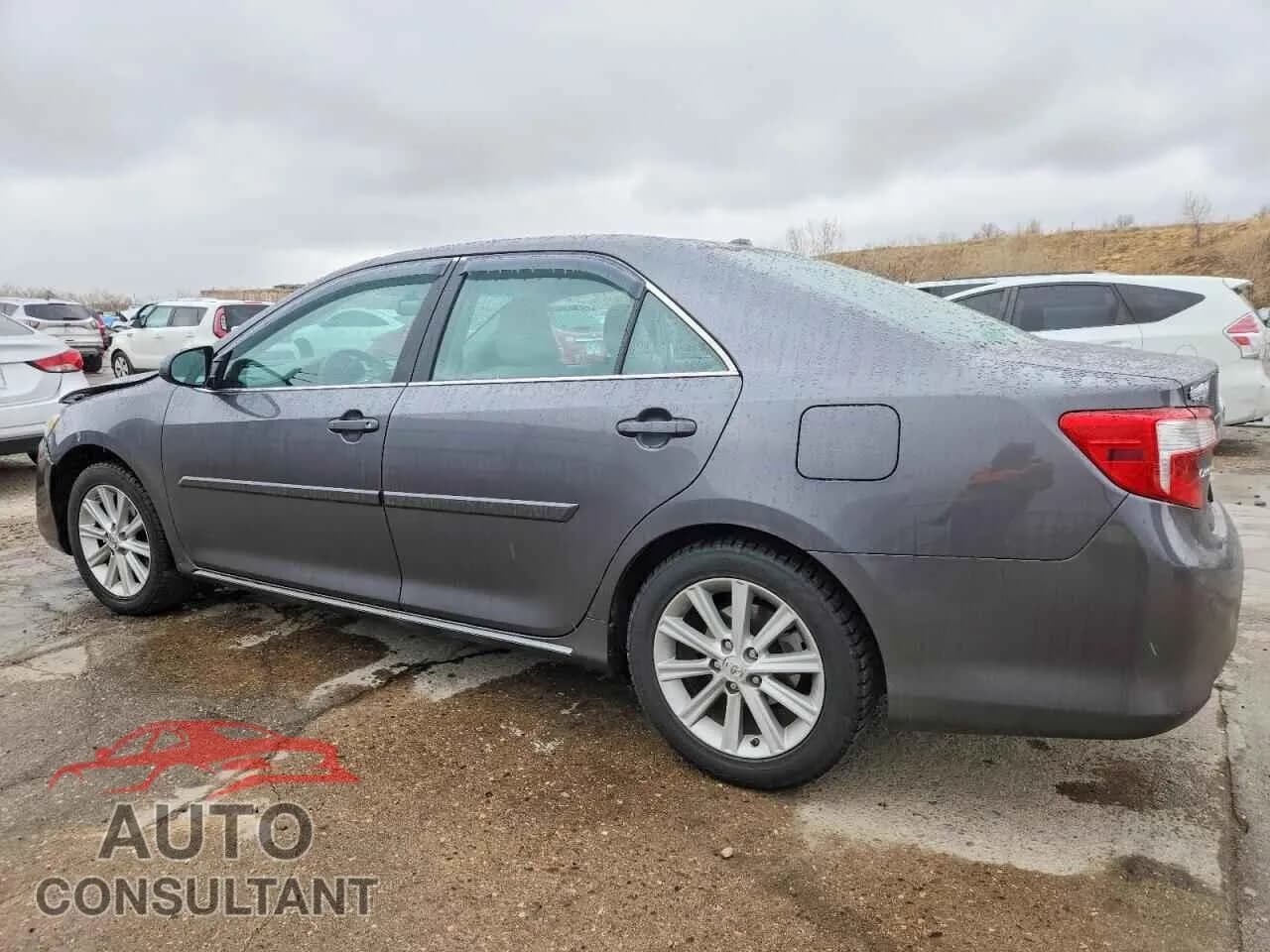 2014 TOYOTA CAMRY Damaged VIN 4T4BF1FKXER348220 – rear exterior 2014 TOYOTA CAMRY Damaged VIN 4T4BF1FKXER348220 – rear exterior