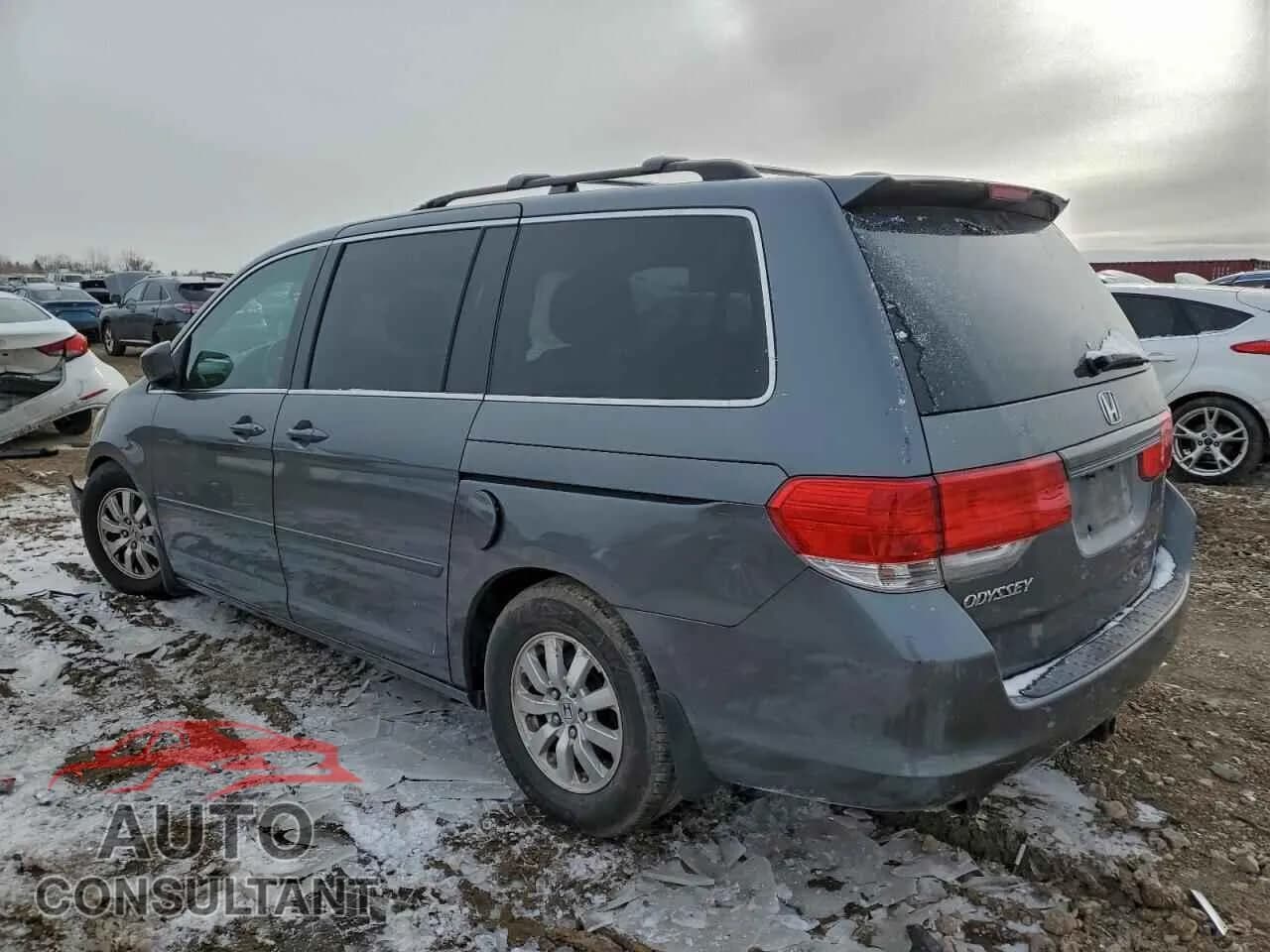 2010 HONDA All Models Damaged VIN 5FNRL3H74AB013371 – rear exterior 2010 HONDA All Models Damaged VIN 5FNRL3H74AB013371 – rear exterior