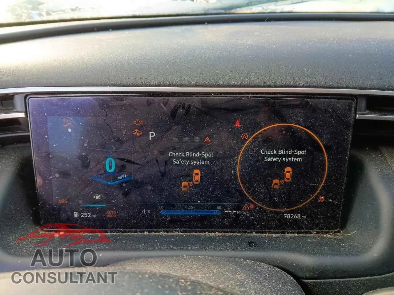 2022 HYUNDAI TUCSON Used VIN 5NMJC3AE2NH051451 – trunk area 2022 HYUNDAI TUCSON Used VIN 5NMJC3AE2NH051451 – trunk area