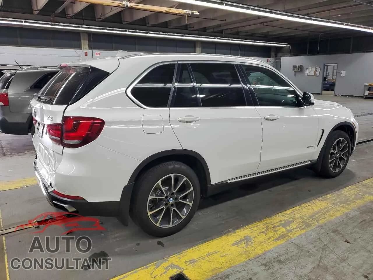 2018 BMW X5 Damaged VIN 5UXKR0C53JL077210 – side profile 2018 BMW X5 Damaged VIN 5UXKR0C53JL077210 – side profile