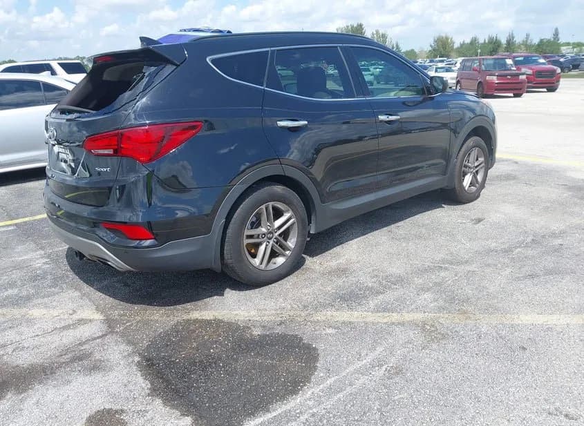 2017 HYUNDAI Santa Fe Used VIN 5XYZU3LB5HG457936 – rear exterior 2017 HYUNDAI Santa Fe Used VIN 5XYZU3LB5HG457936 – rear exterior