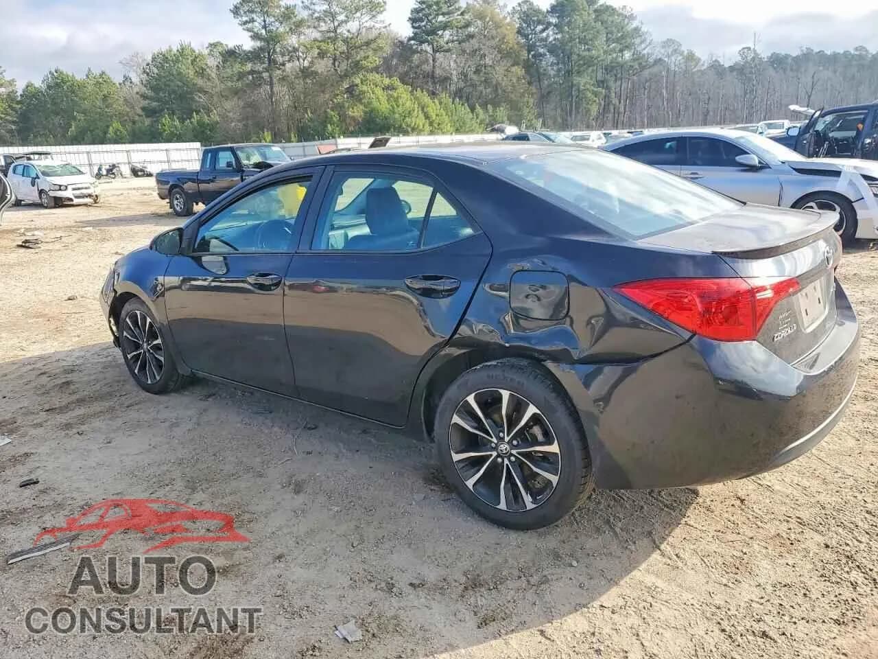 2018 TOYOTA COROLLA Damaged VIN 5YFBURHE3JP762876 – rear exterior 2018 TOYOTA COROLLA Damaged VIN 5YFBURHE3JP762876 – rear exterior