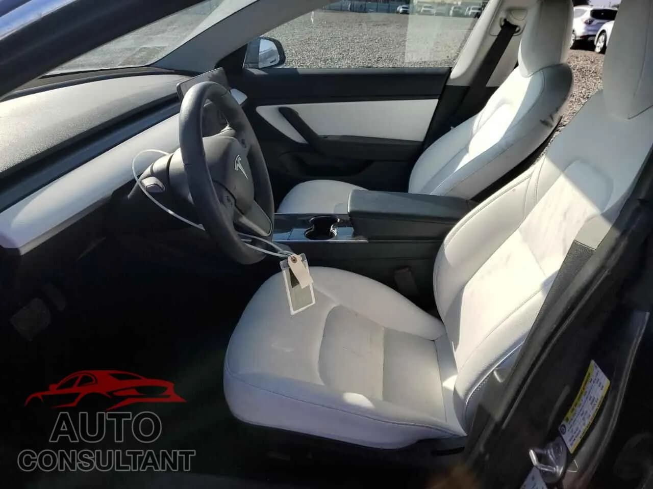 2020 TESLA MODEL 3 Damaged VIN 5YJ3E1EA1LF717857 – exterior detail 2020 TESLA MODEL 3 Damaged VIN 5YJ3E1EA1LF717857 – exterior detail