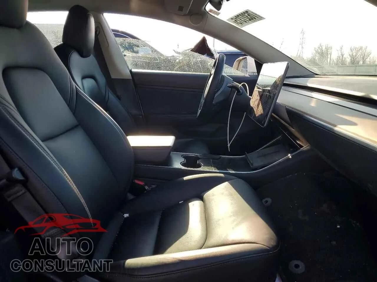 2018 TESLA MODEL 3 Used VIN 5YJ3E1EA3JF052182 – exterior detail 2018 TESLA MODEL 3 Used VIN 5YJ3E1EA3JF052182 – exterior detail