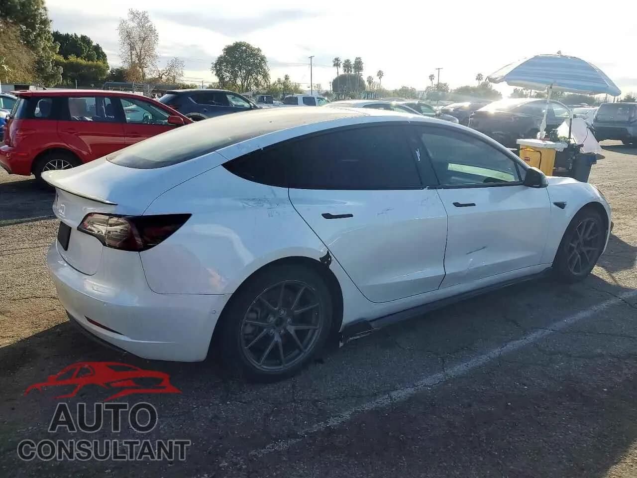 2021 TESLA MODEL 3 Damaged VIN 5YJ3E1EA4MF930724 – side profile 2021 TESLA MODEL 3 Damaged VIN 5YJ3E1EA4MF930724 – side profile