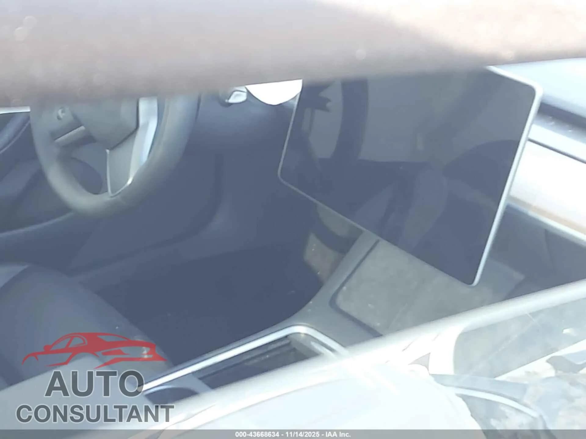 2023 TESLA MODEL 3 Damaged VIN 5YJ3E1EA4PF501409 – exterior detail 2023 TESLA MODEL 3 Damaged VIN 5YJ3E1EA4PF501409 – exterior detail