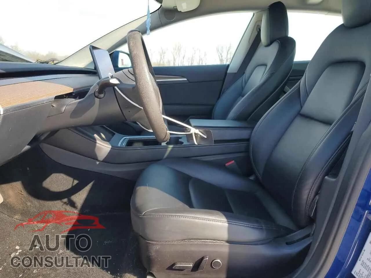 2022 TESLA MODEL 3 Used VIN 5YJ3E1EB1NF265209 – exterior detail 2022 TESLA MODEL 3 Used VIN 5YJ3E1EB1NF265209 – exterior detail